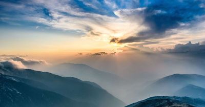 Sun Rays bursting through clouds
